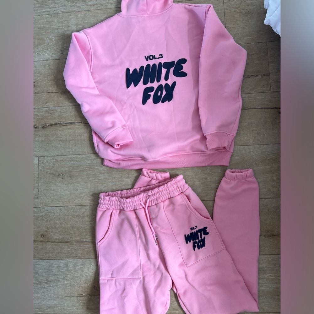 White fox pink track suit, never worn, size small